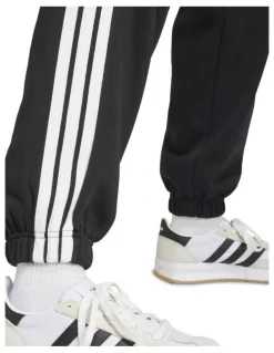 adidas Essentials 3-Stripes Fleece Loose-Fit Joggers in Black
