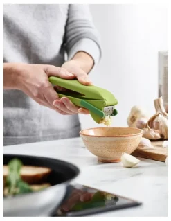 Joseph Joseph Clean Force Garlic Press in Green